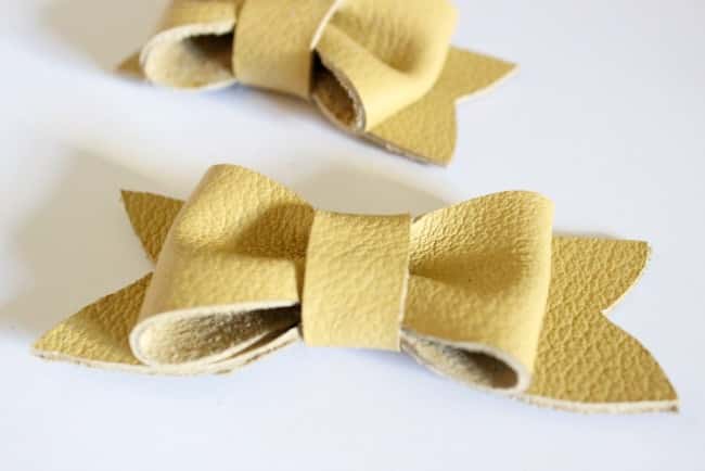 This adorable yellow leather bow is a cute, simple accessory you can make yourself
