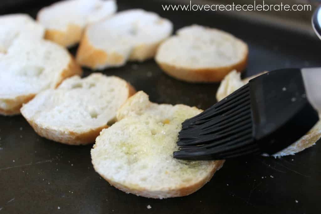 Bake the baguette slices with a bit of olive oil