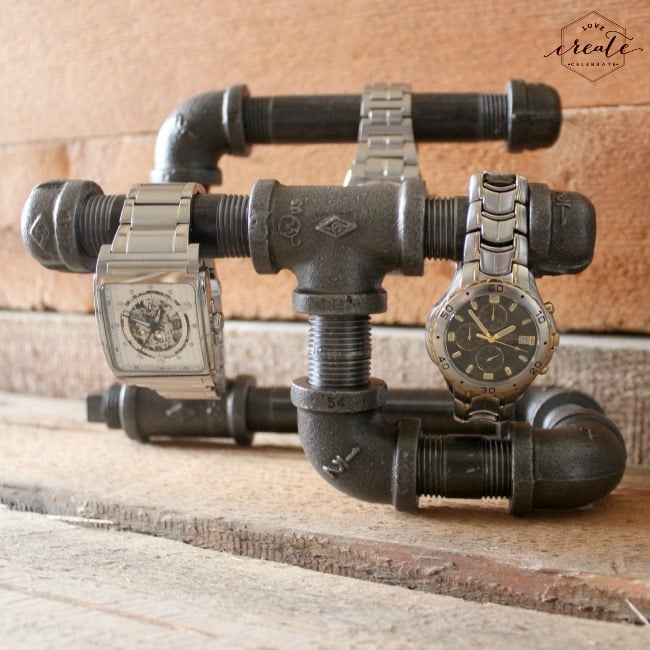 This DIY industrial watch holder made with vintage pipes is unexpected and functional. 