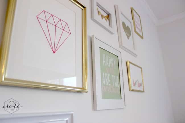 Chic white and gold gallery wall for your daughter's room! 