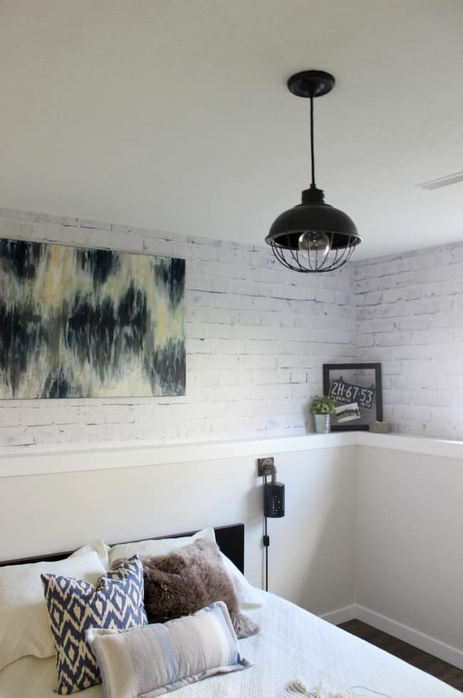 Love the mix of modern and industrial decor in this bedroom design! Love the industrial light fixture!