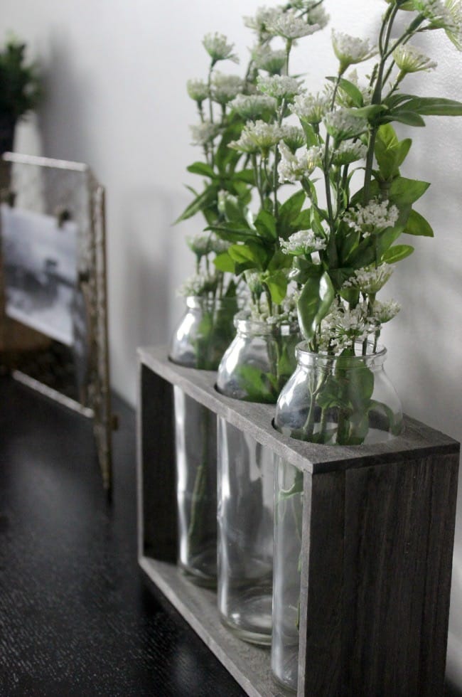 Faux greenery used to create a cozy guest bedroom.