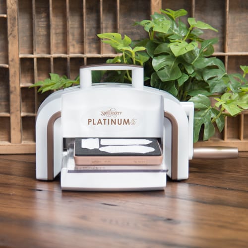 I used this awesome  Platinum 6 machine from Spellbinders for this DIY wooden magnets project