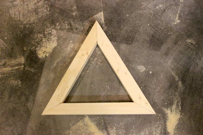 Cut the first pieces into triangles for the base of the triangle pallet planters
