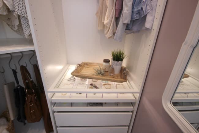 This lighted shelf looks so glamorous in the renovated closet.