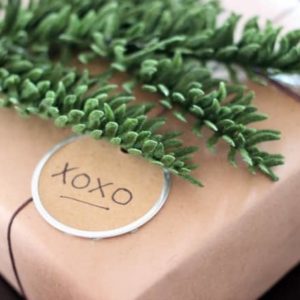 The perfect rustic gift wrapping ideas. I love the black, white and green. The greenery and wood and perfect natural elements!