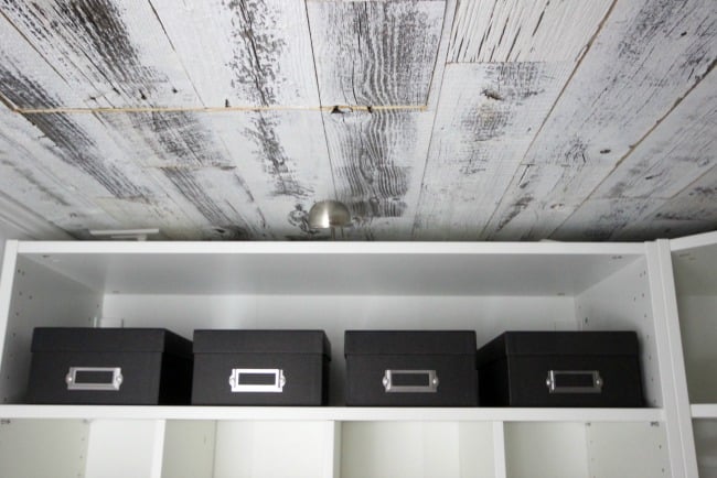 This weathered wood ceiling is such a stunning and simple addition to any room