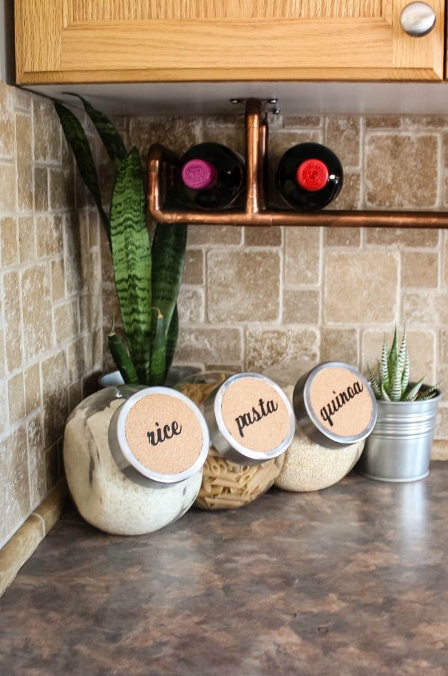 I make these cricut cork labels to organize my kitchen