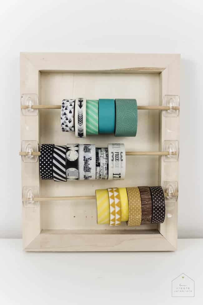 Organize your craft space with this simple DIY that will take you less than 5 minutes! Great for washi tape, ribbon, twine, etc. and PERFECT for any craft space!