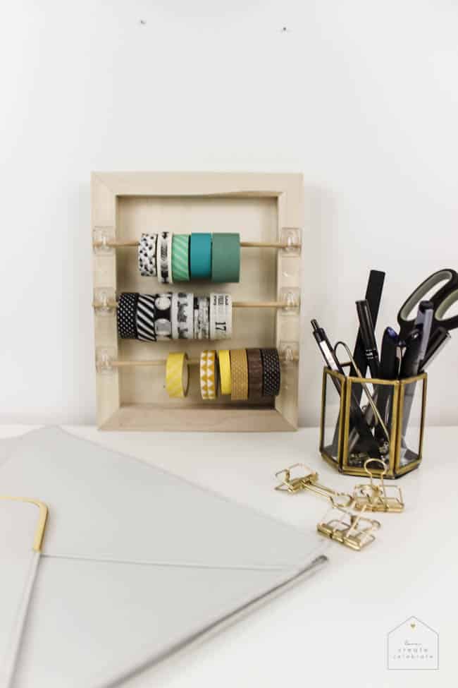 Organize your craft space with this simple DIY that will take you less than 5 minutes! Great for washi tape, ribbon, twine, etc. and PERFECT for any craft space!