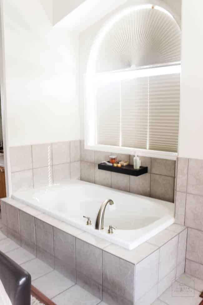 Love this modern bathroom design! Gorgeous faucets, fixtures, and tile choices! Follow along as this outdated bathroom is transformed into a beautiful modern oasis! 