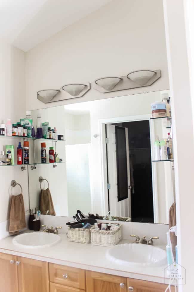 Love this modern bathroom design! Gorgeous faucets, fixtures, and tile choices! Follow along as this outdated bathroom is transformed into a beautiful modern oasis! 