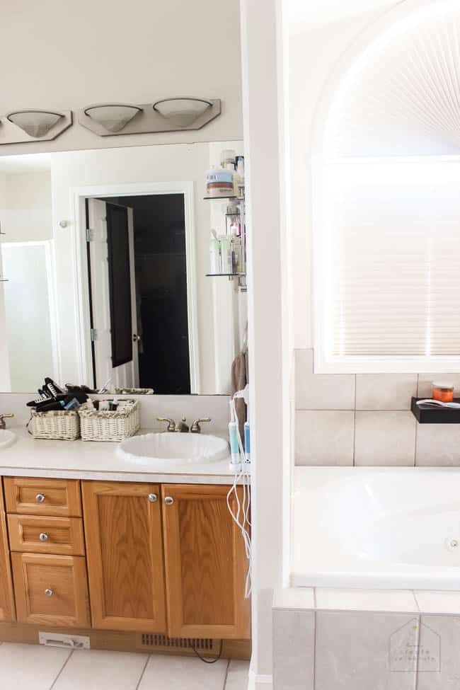 Love this modern bathroom design! Gorgeous faucets, fixtures, and tile choices! Follow along as this outdated bathroom is transformed into a beautiful modern oasis! 