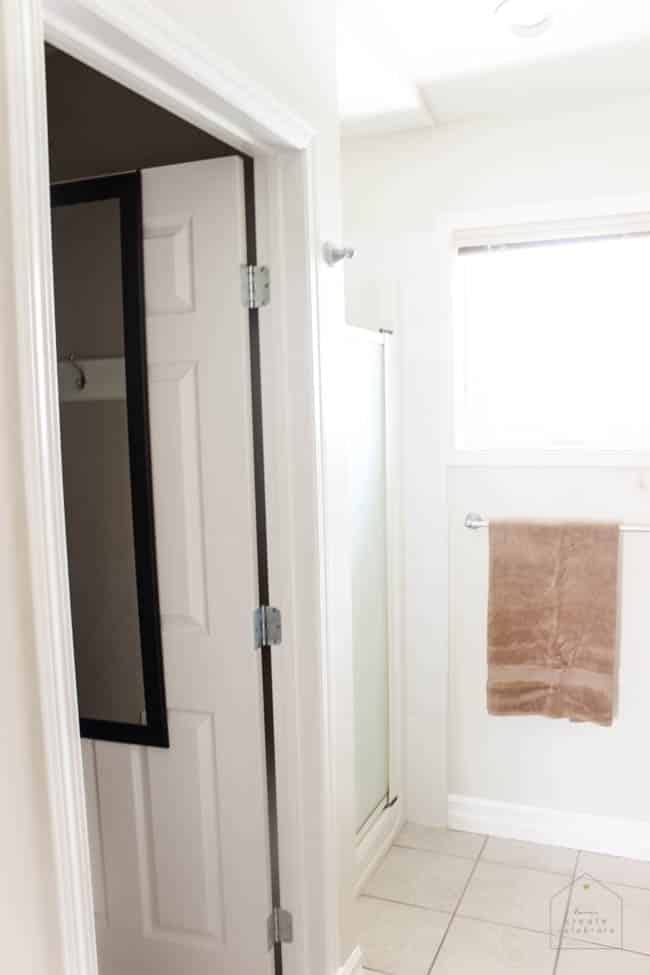 Love this modern bathroom design! Gorgeous faucets, fixtures, and tile choices! Follow along as this outdated bathroom is transformed into a beautiful modern oasis! 