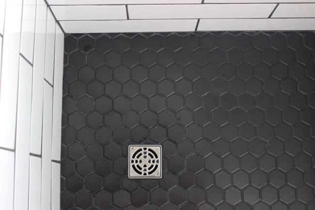 The geometric shower floor adds dimension.