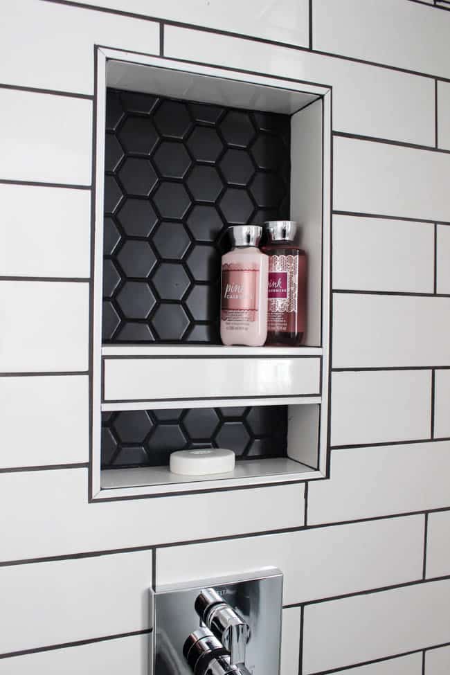 This small detail matches the geometric shower floor.