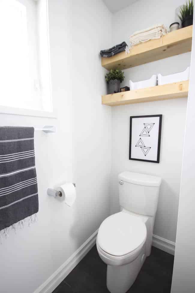 We even upgraded the toilet to one with a consealed back, and even it looks sleek and modern in this space.