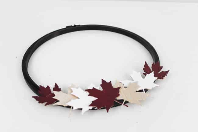 A beautiful modern hoop wreath for Canada Day! Using a simple embroidery hoop and balsa wood maple leaves, you can celebrate the birthday of Canada in style! Love the red, white, and black! 