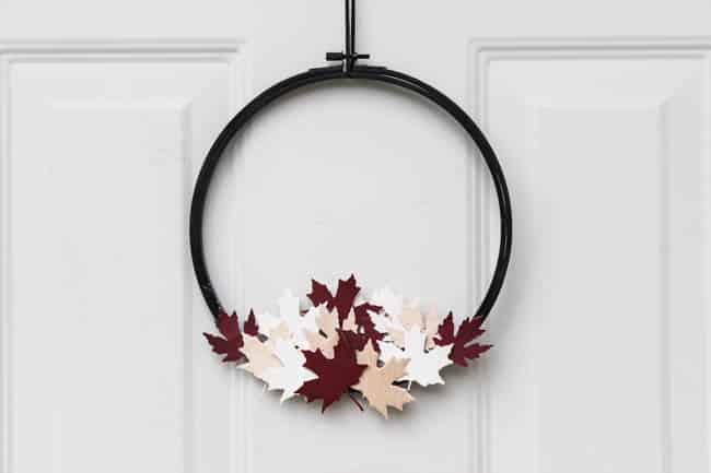 A beautiful modern hoop wreath for Canada Day! Using a simple embroidery hoop and balsa wood maple leaves, you can celebrate the birthday of Canada in style! Love the red, white, and black! 