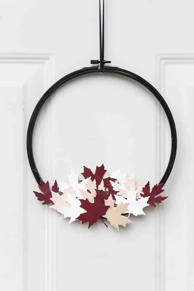 A beautiful modern hoop wreath for Canada Day! Using a simple embroidery hoop and balsa wood maple leaves, you can celebrate the birthday of Canada in style! Love the red, white, and black!