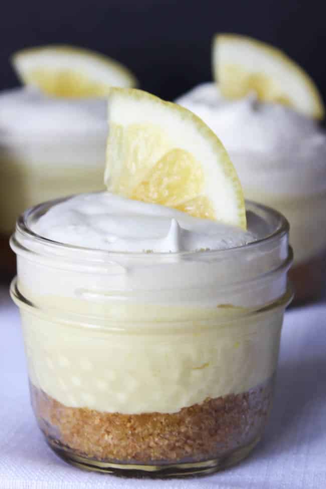 The perfect lemon cheesecake! Prepared in a mini mason jar for perfect individual portions. Great dessert for Spring and Summer!