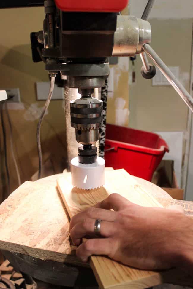 Image of a hole saw about to be used to cut holes for the Terra Cotta pots.