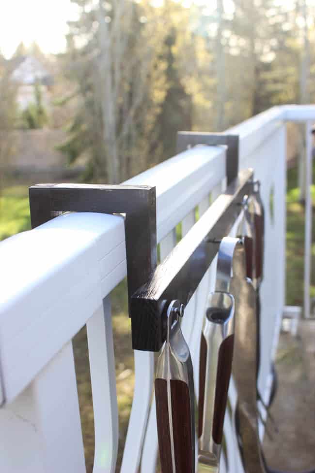 Build the perfect deck accessory in just 10 minutes with this DIY BBQ utensil holder. Modify it to fit your own deck rails. Perfect DIY for men! Any husband, father, or guy who likes BBQing would love one!