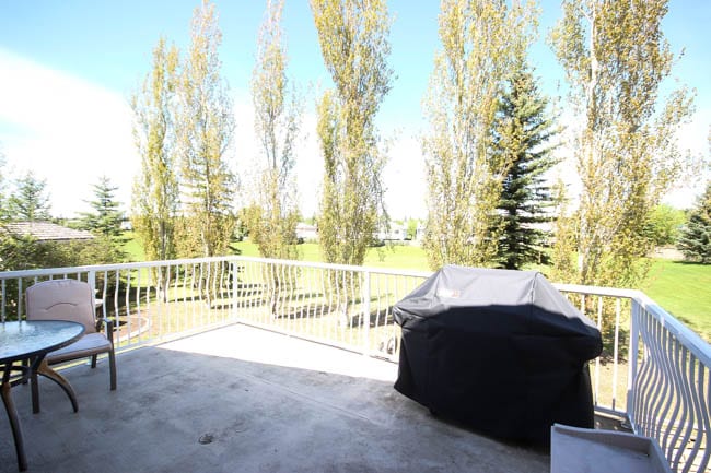 A stunning backyard makeover inspired completed with Behr paints. Love the bright painted blue doors, and the grey outdoor sectional. Beautiful DIY pallet side tables, and black and white accessories complete the space. Summer is here! 