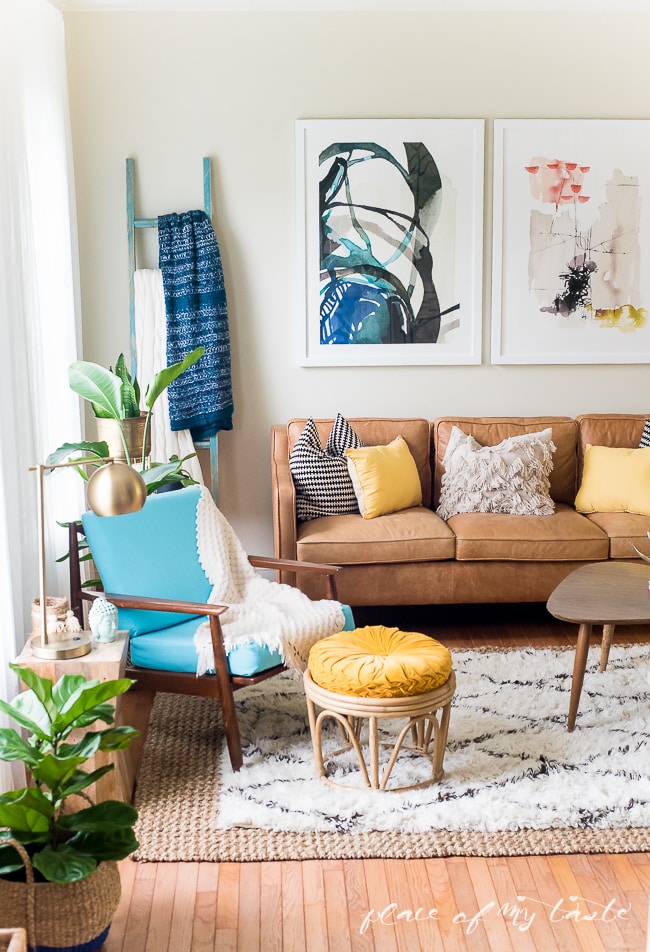 Beautifully layered modern modern rugs for any room in the home! LOVE this beautiful design trend and now you can incorporate it into your home with beautifully layered sisal, jute, cowhide, and modern rugs. Love this living room! 