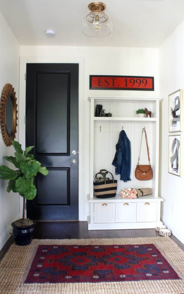 Beautifully layered modern modern rugs for any room in the home! LOVE this beautiful design trend and now you can incorporate it into your home with beautifully layered sisal, jute, cowhide, and modern rugs. Love this mudroom! 