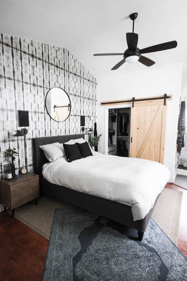 Beautifully layered modern modern rugs for any room in the home! LOVE this beautiful design trend and now you can incorporate it into your home with beautifully layered sisal, jute, cowhide, and modern rugs. Love this bedroom! 