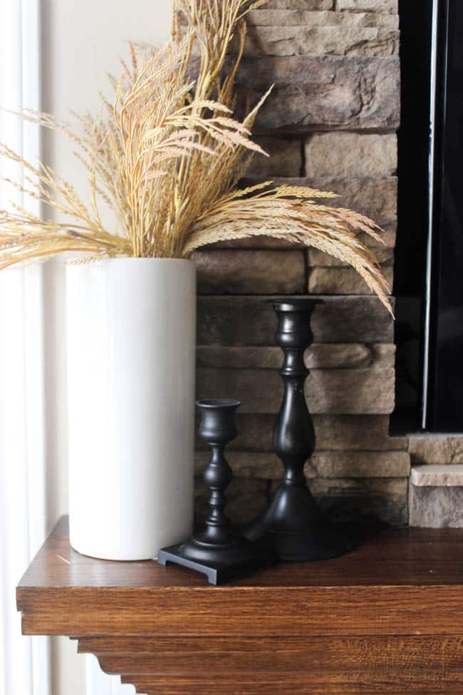 Decor with wheat in a white vase