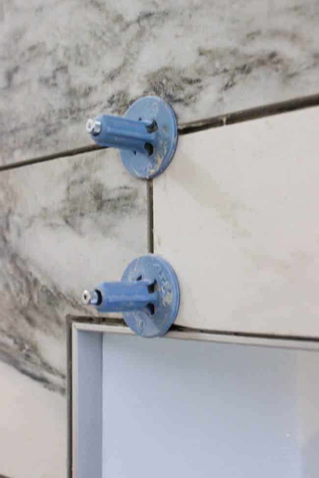 These spindles help keep tile level while they dry