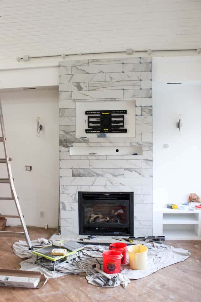 the ATR Tile Leveling Alignment System helped move along our one room challenge by making the fireplace tiles look amazing