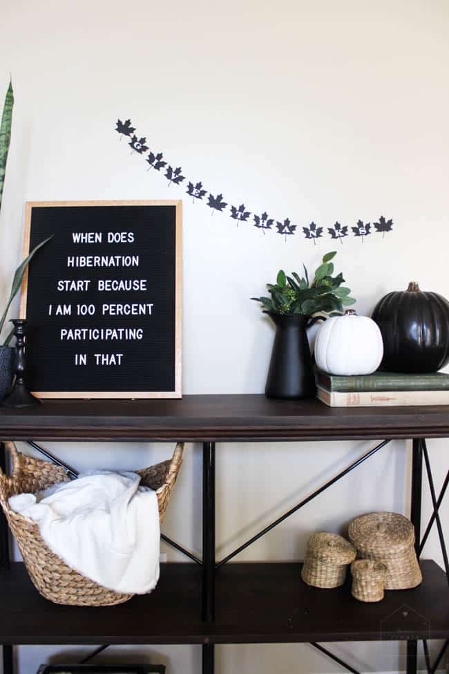 A beautiful modern fall decor idea. Make this simple black and white DIY leaf banner to celebrate Thanksgiving Day!