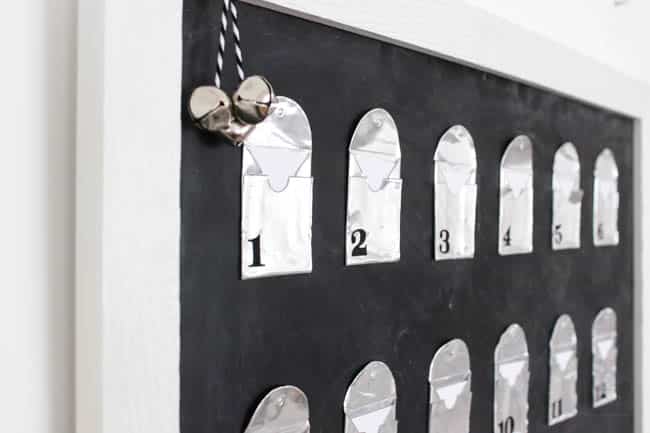 Love this simple modern advent calendar. The DIY metal envelopes are perfect for sharing your favourite winter and holiday activities. Love this idea for the Christmas season! 