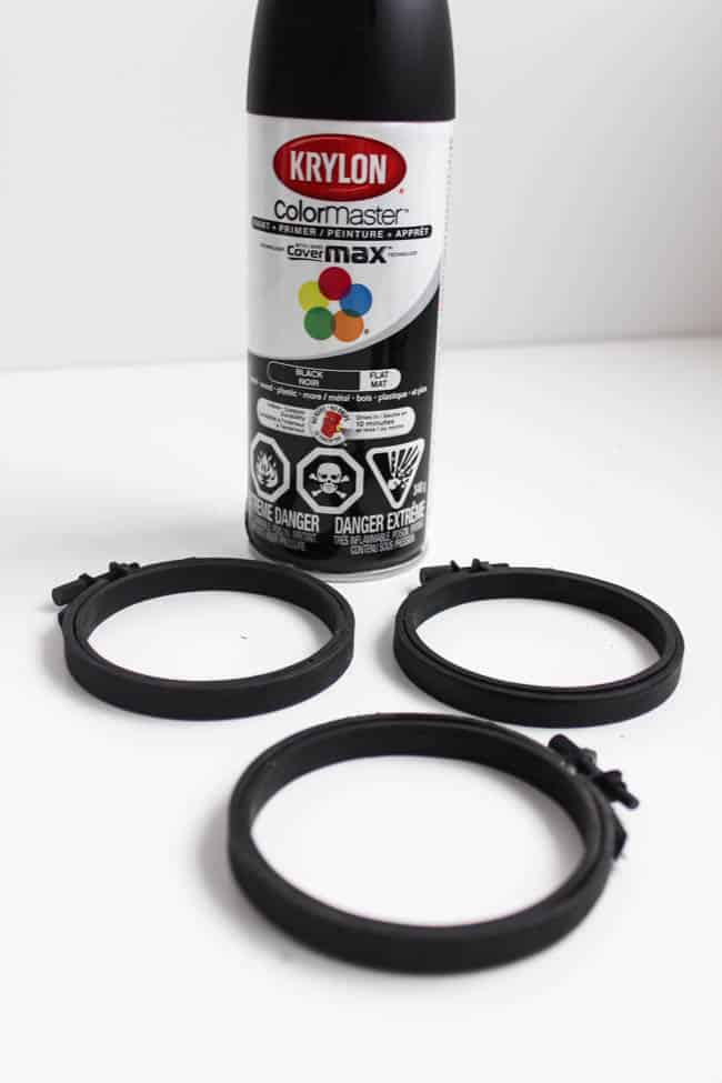 Spray paint the mini embroidery hoops with black spray paint. I used Krylon Color Master