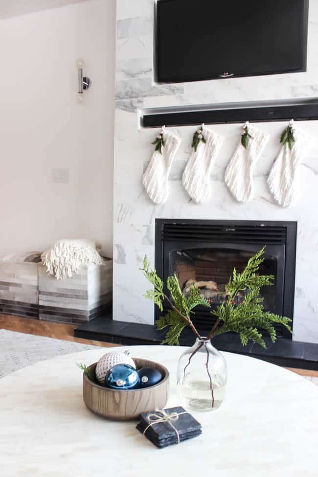 Love this modern Christmas home tour! Beautiful decorating ideas and inspiration for any home! Love the blue, black and white colour palette in this gorgeous contemporary living room. 