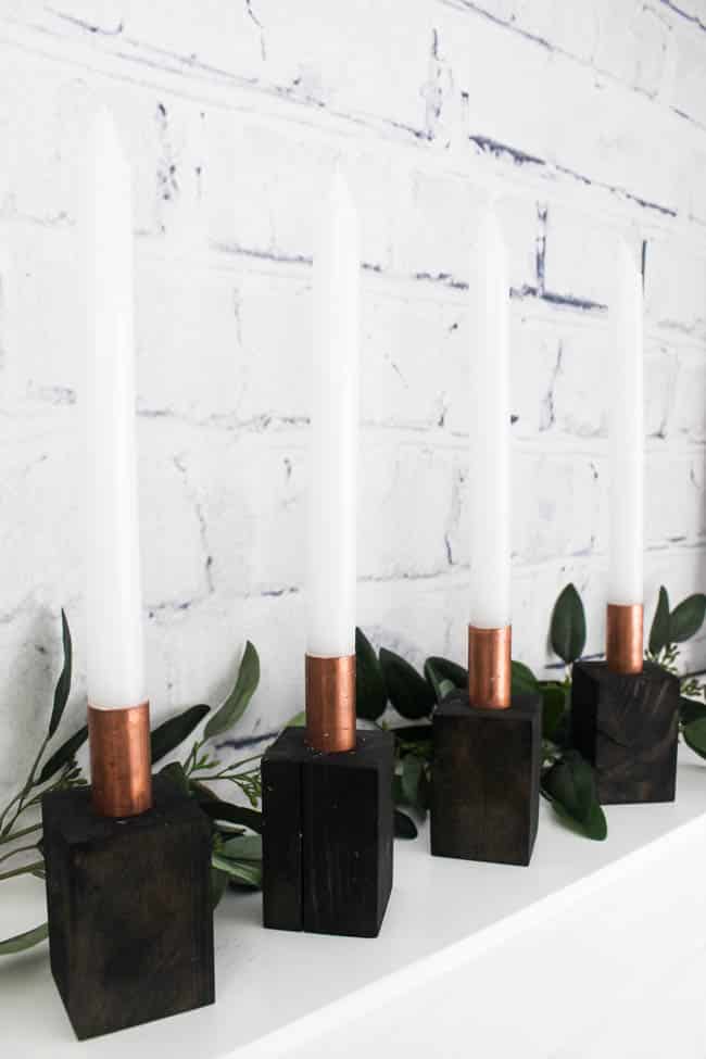 I love these beautiful modern Advent Candlesticks. This DIY is the perfect addition to your Christmas decor and the perfect way to celebrate the meaning behind Christmas. The addition to celebrate advent this holiday season! 