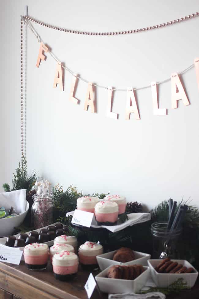 Desserts and coffee pods on a coffee and dessert bar.