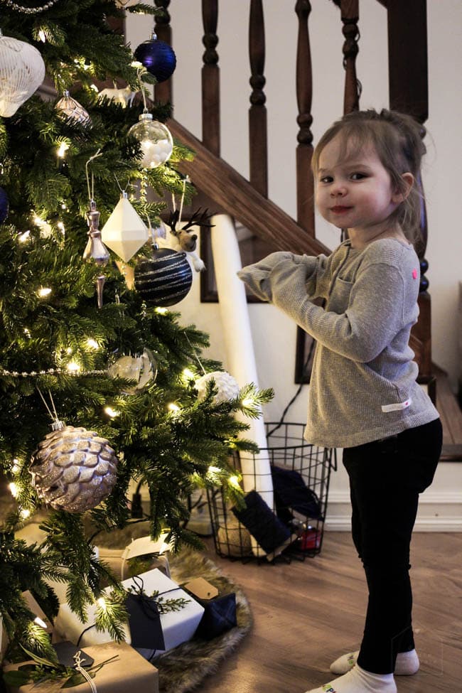 Girls sitting with the Christmas Tree! 