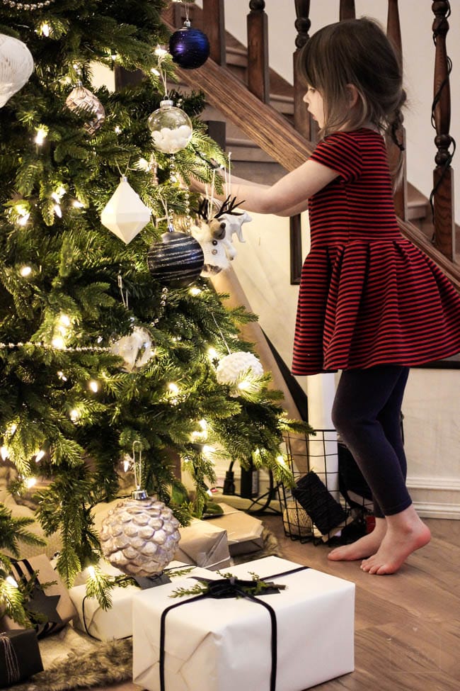 Girls sitting with the Christmas Tree! 