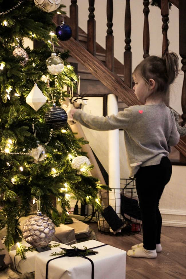 Girls sitting with the Christmas Tree! 