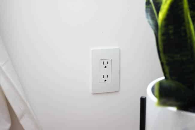 Screwless wall plates like this electrical outlet have a sleek and modern look