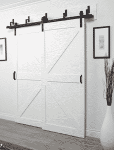 Modern Hallway Barn Door - Beautiful modern hallway design plans! Love how the hallway lighting, the long runner, and the barn doors mix together for the perfect modern design.