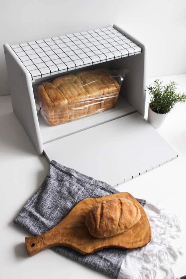 Wow! This transformation is stunning! DIY your own old or thrifted wooden bread box with just a few supplies! Love the modern look of this new bread box makeover! The perfect addition to your kitchen.