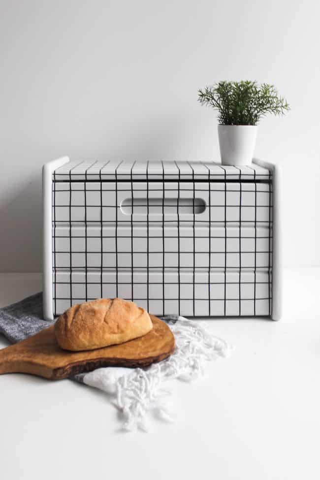 Wow! This transformation is stunning! DIY your own old or thrifted wooden bread box with just a few supplies! Love the modern look of this new bread box makeover! The perfect addition to your kitchen.