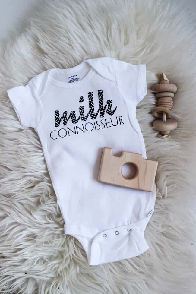 This milk connoisseur DIY baby onesie was created with a Cricut iron on vinyl pattern