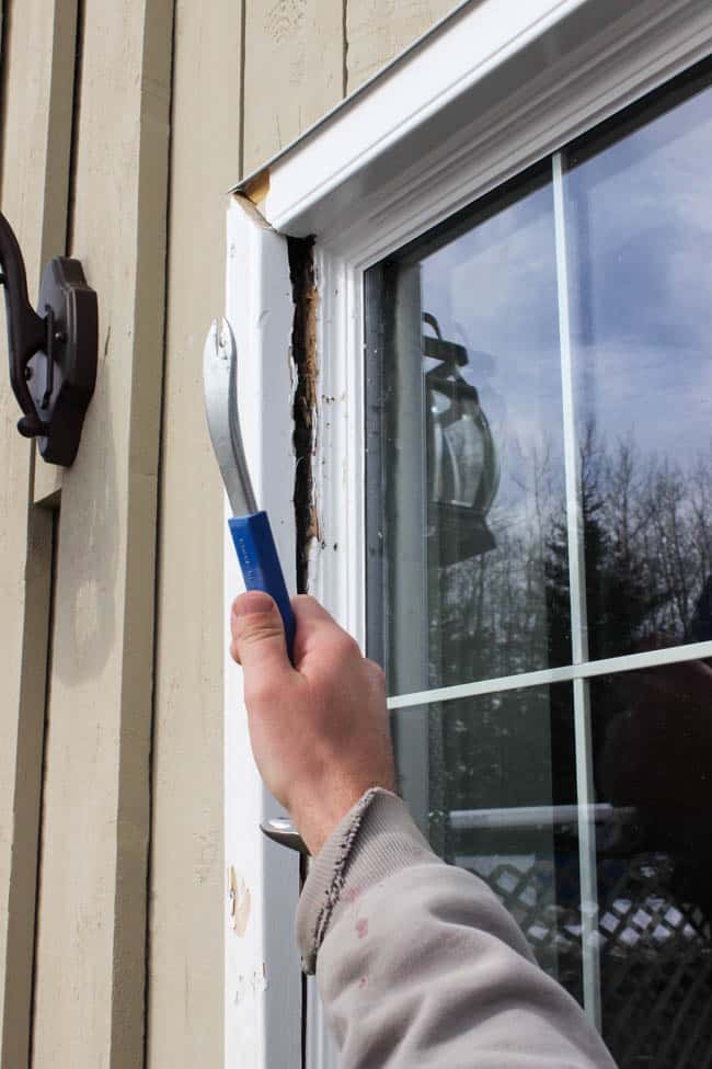 Thinking about replacing your front door? This is everything you need to know before you walk into The Home Depot and pick out a new design! We share how we got the proper measurements and picked our design elements before going to the store. Love the modern design of this new black front door!