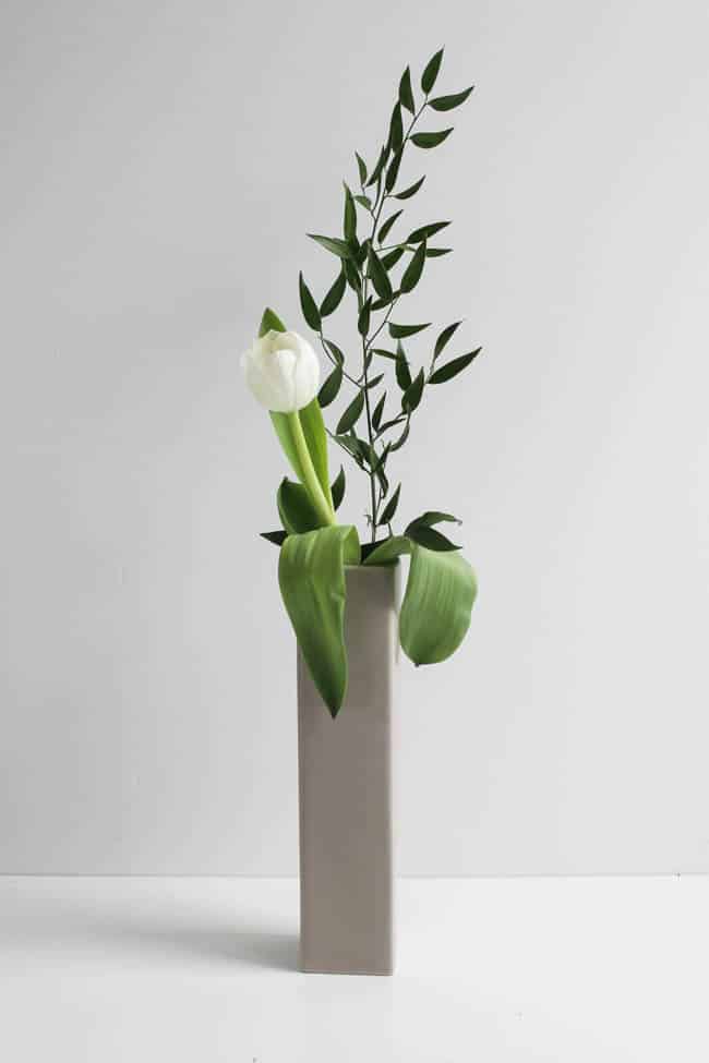 Tall vase with single flower stems